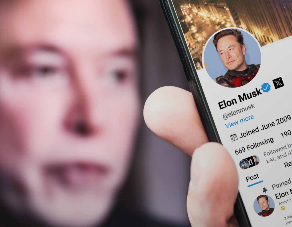 Macro shot of Elon Musk and his X (formerly Twitter) profile